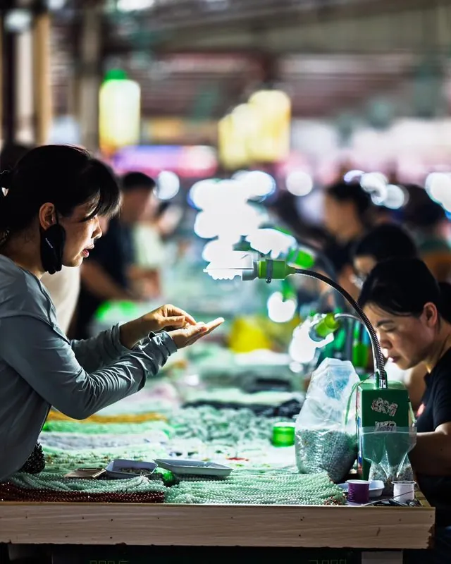 the jade markets of sihui, china- where thousands of merchants, packed within a few bustling wholesale warehouses, peddle precious gemstones