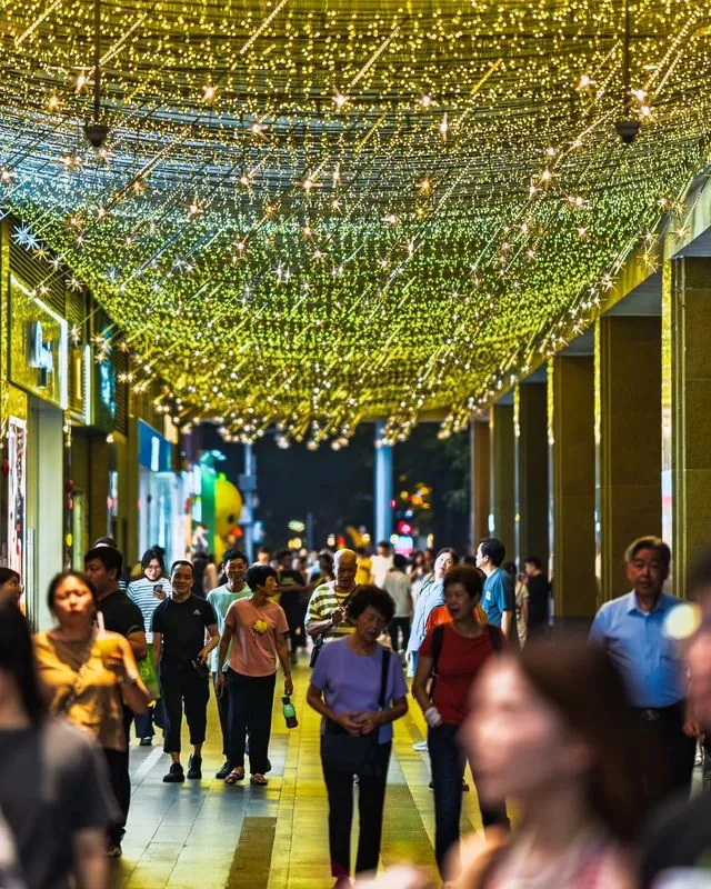 beijng road is a bustling busy street, in guangzhou, where domestic tourists come to stroll the wide pedestrian road and consume the abundance of joys