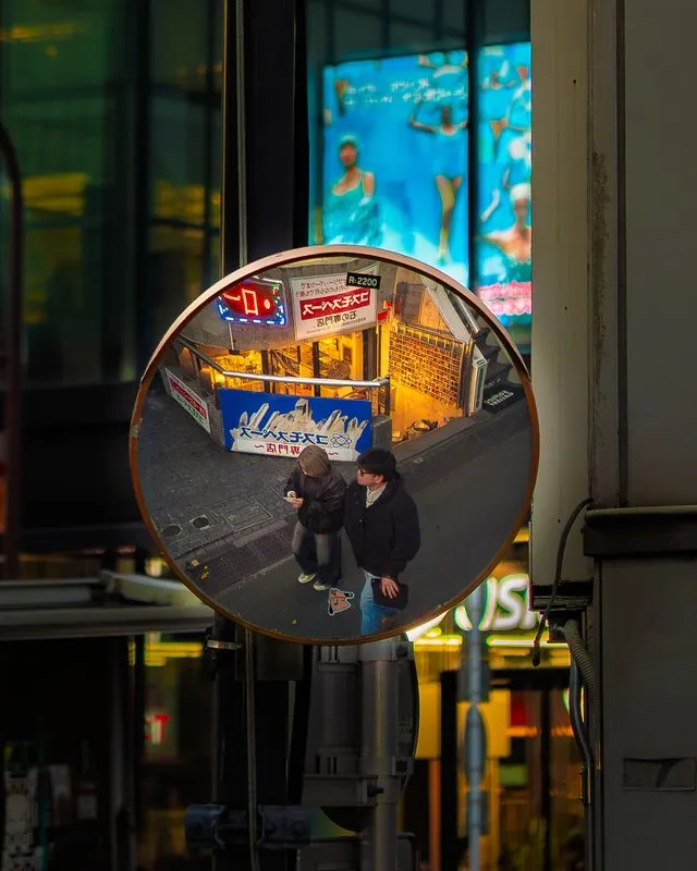 mirror catches what the street ignores