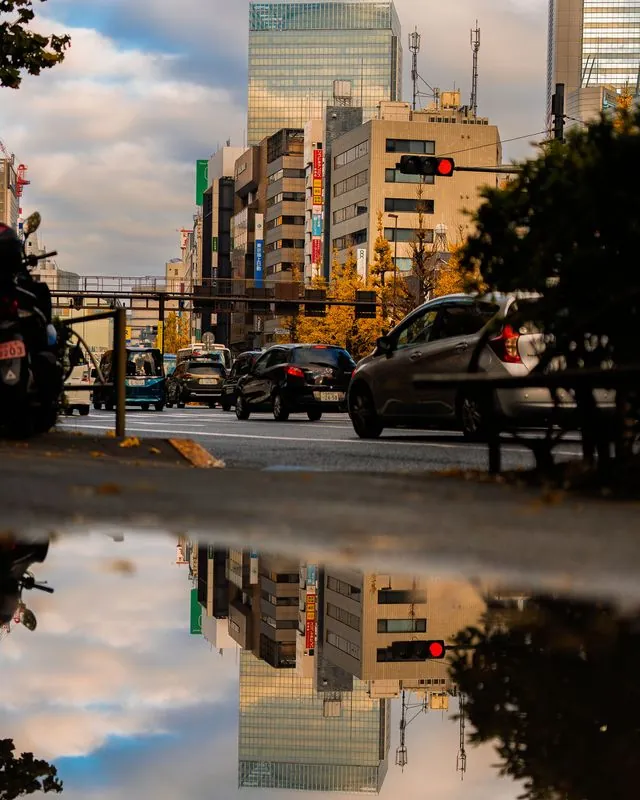 the split sky doubled over the asphalt
