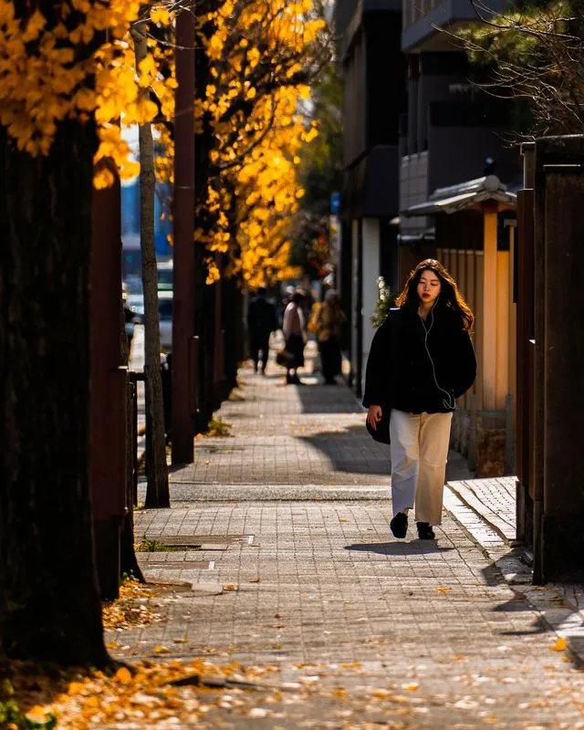 she walks past the shadow of autumn